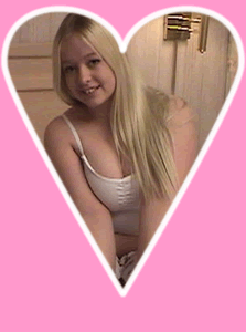 sexy blonde barely 18 teen kirsten posing on a bed